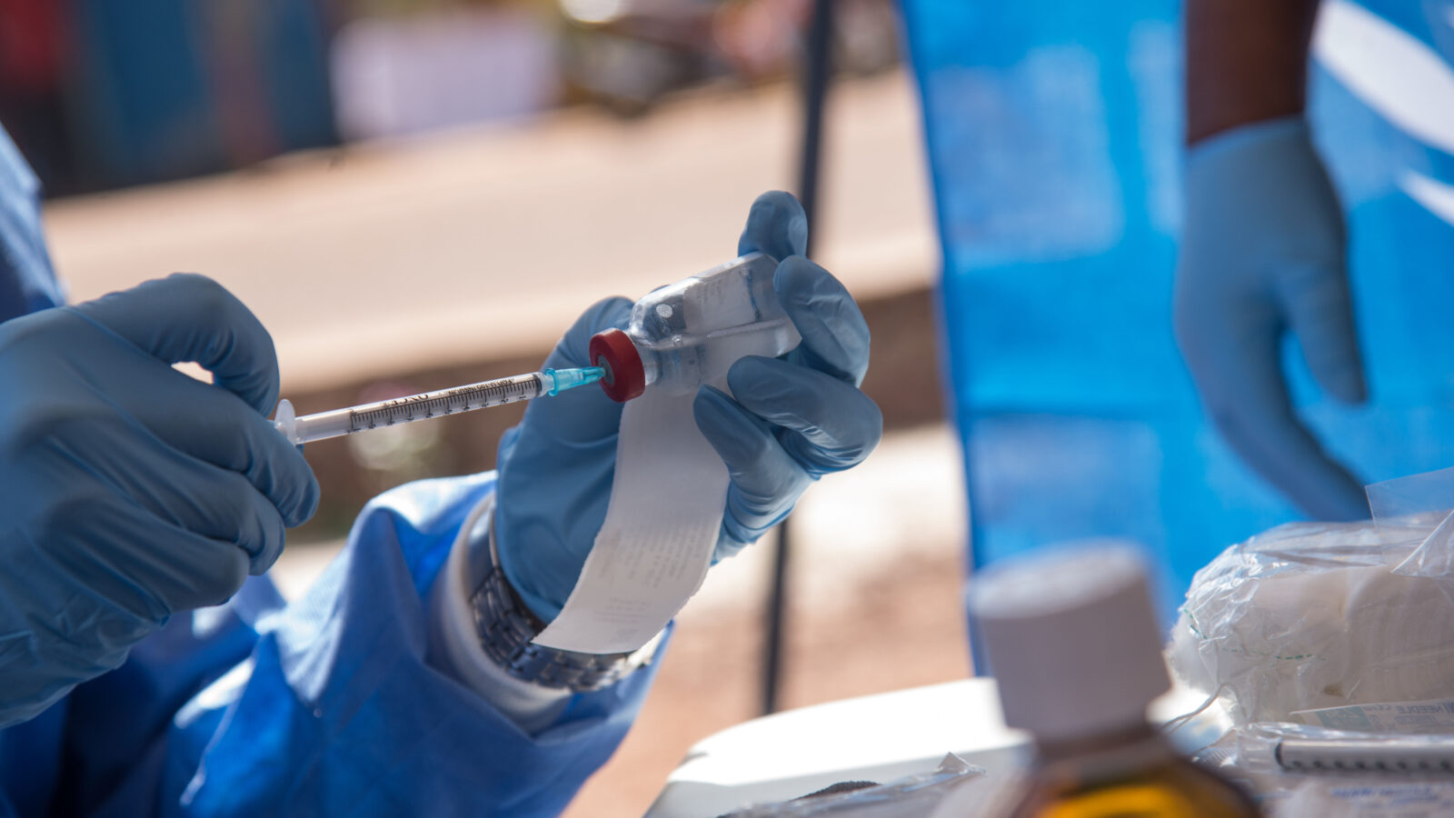 Nurses working with the WHO prepare to administer vaccines in Mbandaka, DRC, during the launch of an Ebola vaccination campaign in May 2018 (Junior D. Kannah:AFP:Getty Images)