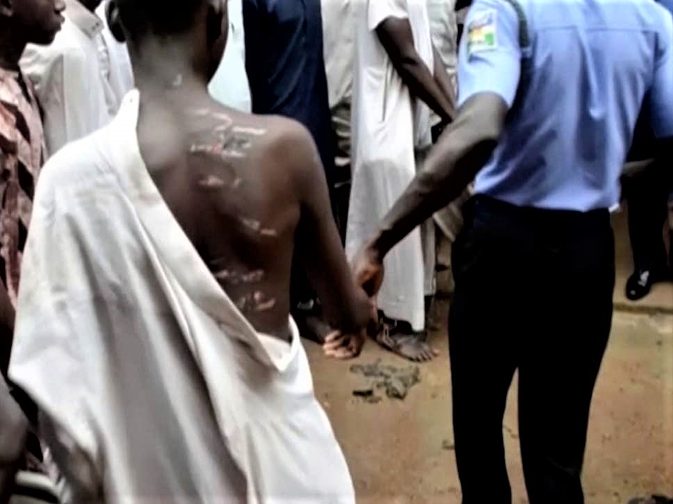 Nigerian police have rescued more than 300 men and boys, some as young as five, from a "house of torture" in the Rigasa area of the northern city of Kaduna, 27 September, 2019. The detainees were allegedly sexually abused, starved and tortured while they were held captive in shackles. A sign above the building reads: "Imam Ahmad Bun Hambal centre for Islamic studies." (REUTERS/Stringer)