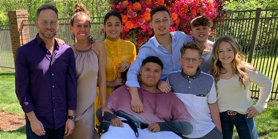 Truett Foster McKeehan (second from the right in the back row), the oldest son of rapper TobyMac (at left), was found dead at 21 on Wednesday. (image tobymac/Instagram).