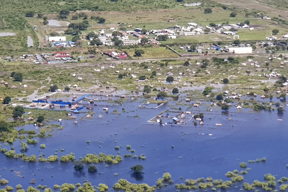 In this photo taken Sunday, Oct. 20, 2019 and released by Medecins Sans Frontieres, areas are submerged by floodwaters between Bor and Pibor, seen from the air, in South Sudan. South Sudan's president on Tuesday, Oct. 29, 2019 declared a state of emergency in 27 counties because of the flooding and parts of the East African region are bracing for a tropical storm that could worsen an already dire humanitarian situation. (Medecins Sans Frontieres via AP)