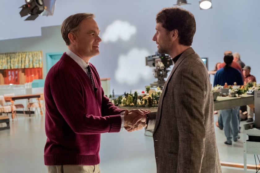  Mister Rogers (Tom Hanks) meets journalist Lloyd Vogel (Matthew Rhys) in “A Beautiful Day in the Neighborhood.” (Lacey Terrell / Sony Pictures Entertainment)
