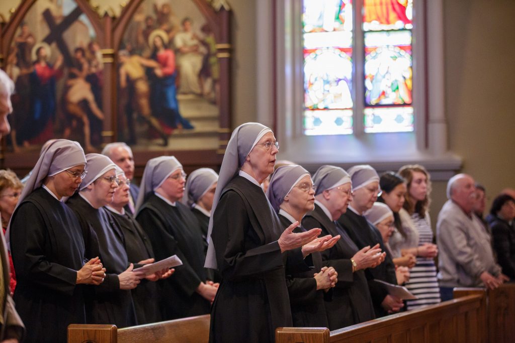 Members of the Little Sisters of the Poor pray during Mass at the Basilica of the Sacred Heart at the University of Notre Dame in Indiana April 9, 2016. (Credit: CNS photo/Peter Ringenberg, Notre Dame Center for Ethics and Culture).
