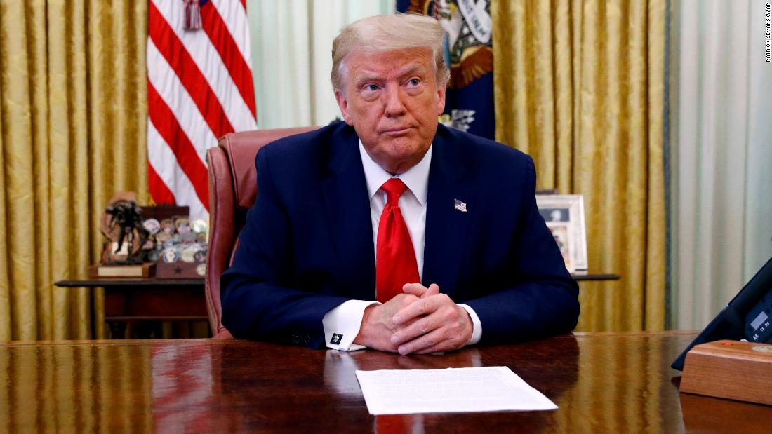 President Donald Trump participates in a law enforcement briefing on the MS-13 gang in the Oval Office of the White House, Wednesday, July 15, 2020, in Washington. (AP Photo/Patrick Semansky)
