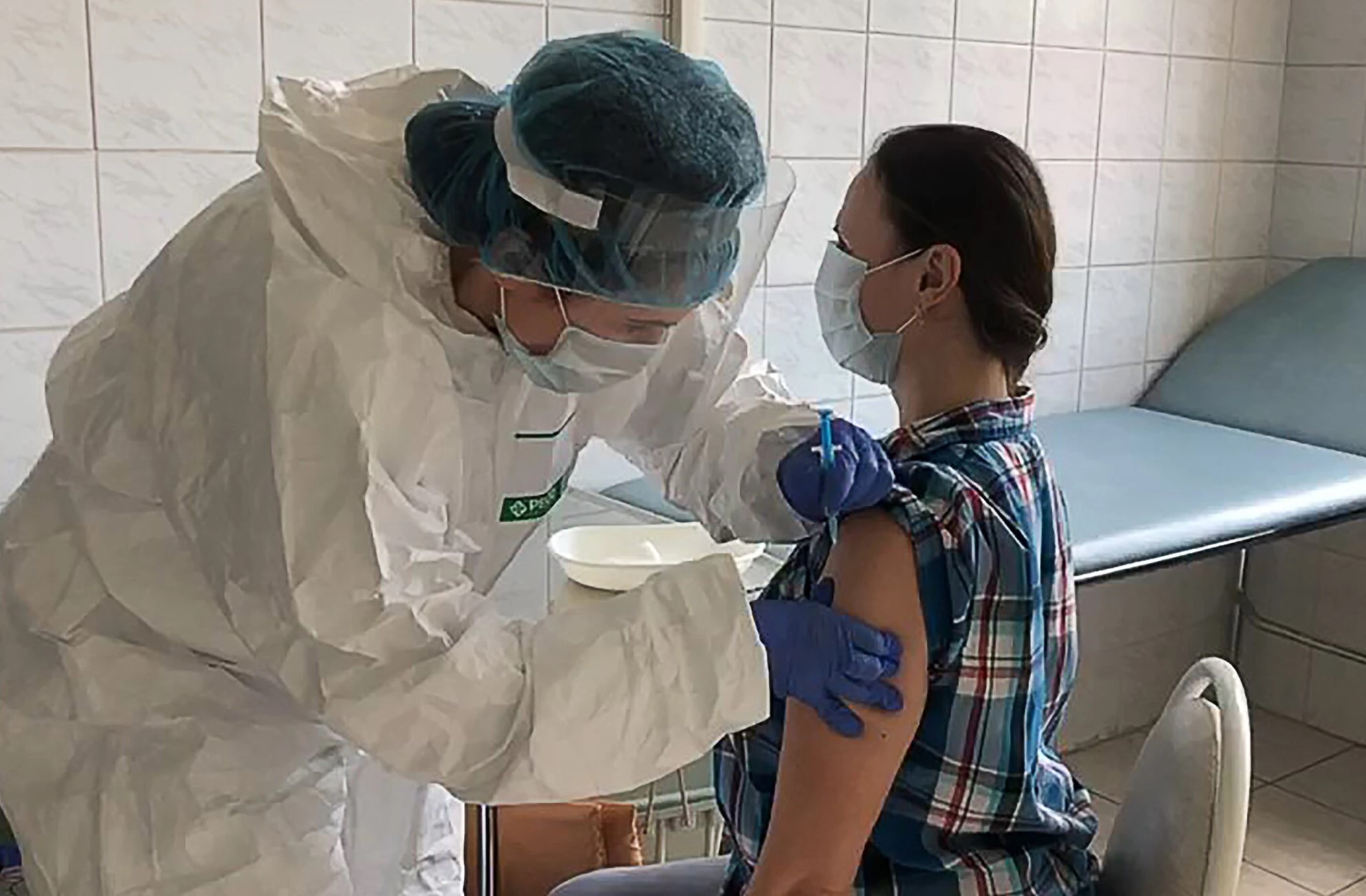 A volunteer received a coronavirus vaccine as part of clinical trials at Sechenov First Moscow State Medical University in June. (Image by Sechenov Medical University Press Office, via Getty Images)
