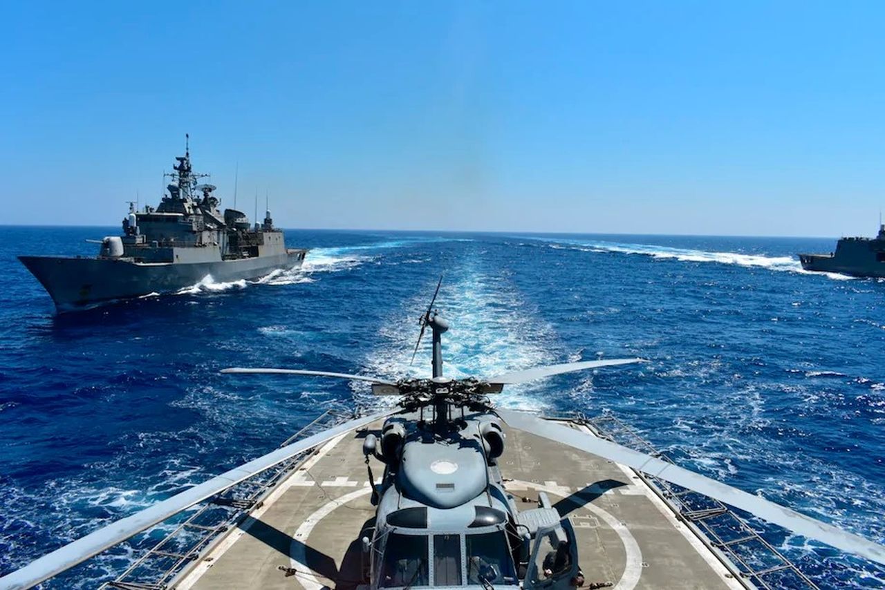 In this photo provided by the Greek Defense Ministry, warships take part in a military exercise in the eastern Mediterranean sea on Aug. 25. (Greek Defense Ministry/AP)