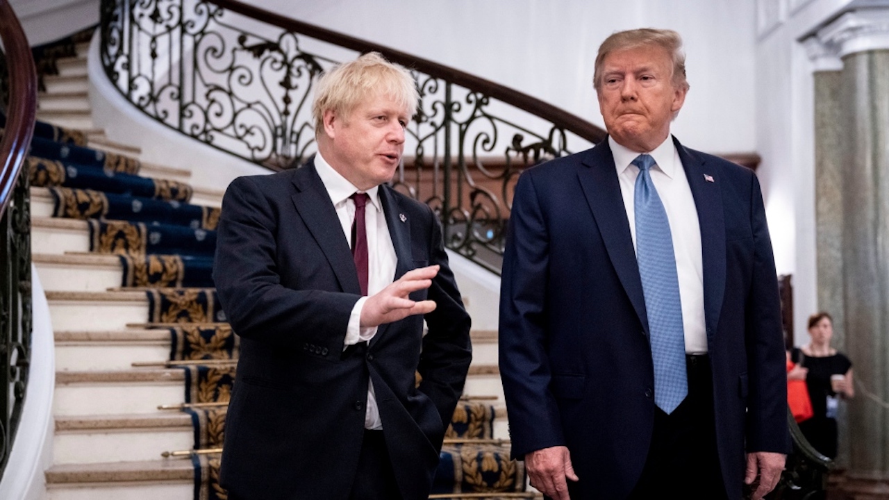 President Donald Trump and Britain's Prime Minister Boris Johnson, left, speak to the media before a working breakfast meeting at the Hotel du Palais on the sidelines of the G7 summit in Biarritz, France. (Photo taken Aug. 25, 2019 by Erin Schaff/The New York Times, Pool, File)