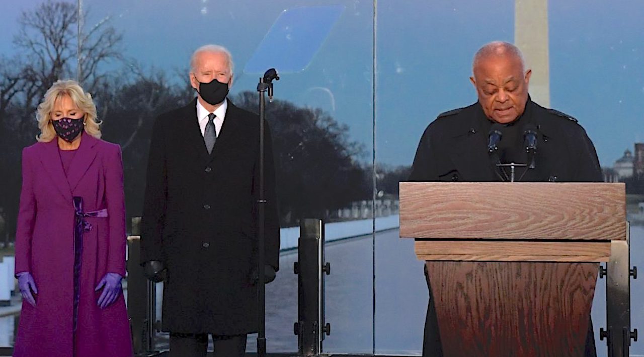 (L-R) US First Lady Jill Biden, US President Joe Biden and Cardinal Wilton Gregory, Archbishop of Washington at the Lincoln Memorial in Washington, DC. (Photo by Patrick T. FALLON / AFP) via Getty Images)