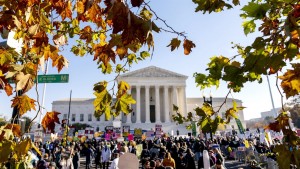 Abortion rights advocates and anti-abortion protesters demonstrate in front of the U.S. Supreme Court, Wednesday, Dec. 1, 2021, in Washington, as the court hears arguments in a case from Mississippi, where a 2018 law would ban abortions after 15 weeks of pregnancy, well before viability. (AP Photo/Andrew Harnik)