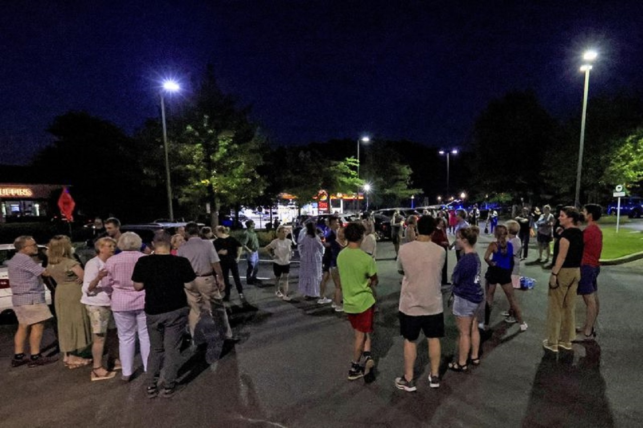 Church members gather for a prayer circle after a shooting at the St. Stephen's Episcopal Church on Thursday, June 16, 2022 in Vestavia, Ala. (AP Photo/Butch Dill)