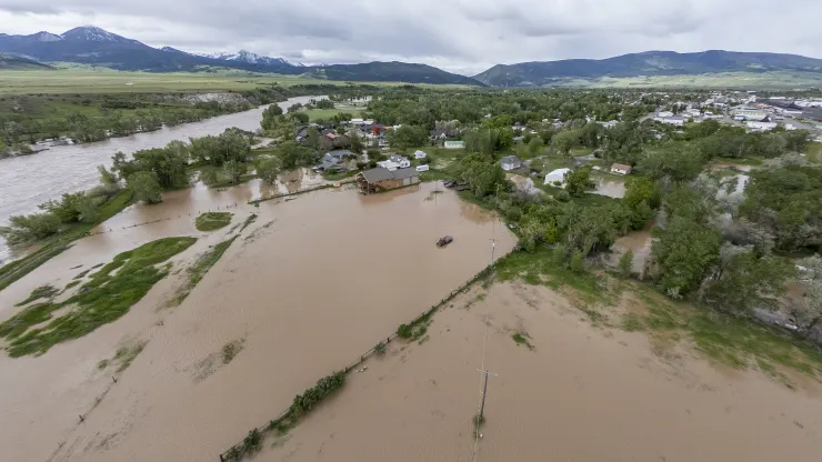 In this aerial view, flooding is seen on June 14, 2022 in Livingston, Montana. The Yellowstone River hit has a historic high flow from rain and snow melt from the mountains in and around Yellowstone National Park. (image William Campbell-Getty Images)